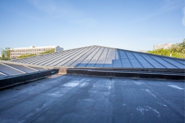 Pros and Cons of Flat Roofs in MD